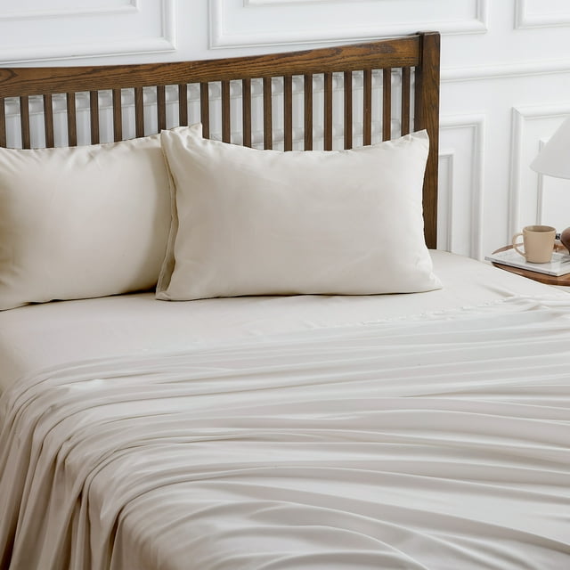 Hitime 4 Pieces Microfiber King Sheet Set displayed on a bed with a wooden slatted headboard. The set includes a flat sheet, fitted sheet, and two pillowcases in a neutral tone, made from ultra-soft, breathable microfiber fabric. Featuring deep pockets for mattresses up to 16 inches, this king-size bedding is fade-resistant, wrinkle-resistant, and suitable for all seasons. Perfect for luxury hotel-style bedroom decor and easy care.