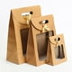 thumbnail image 2 of GOOHOCHY 12 bolsas de regalo navideñas con ventana, de papel kraft, con lazo y asa., 2 of 8