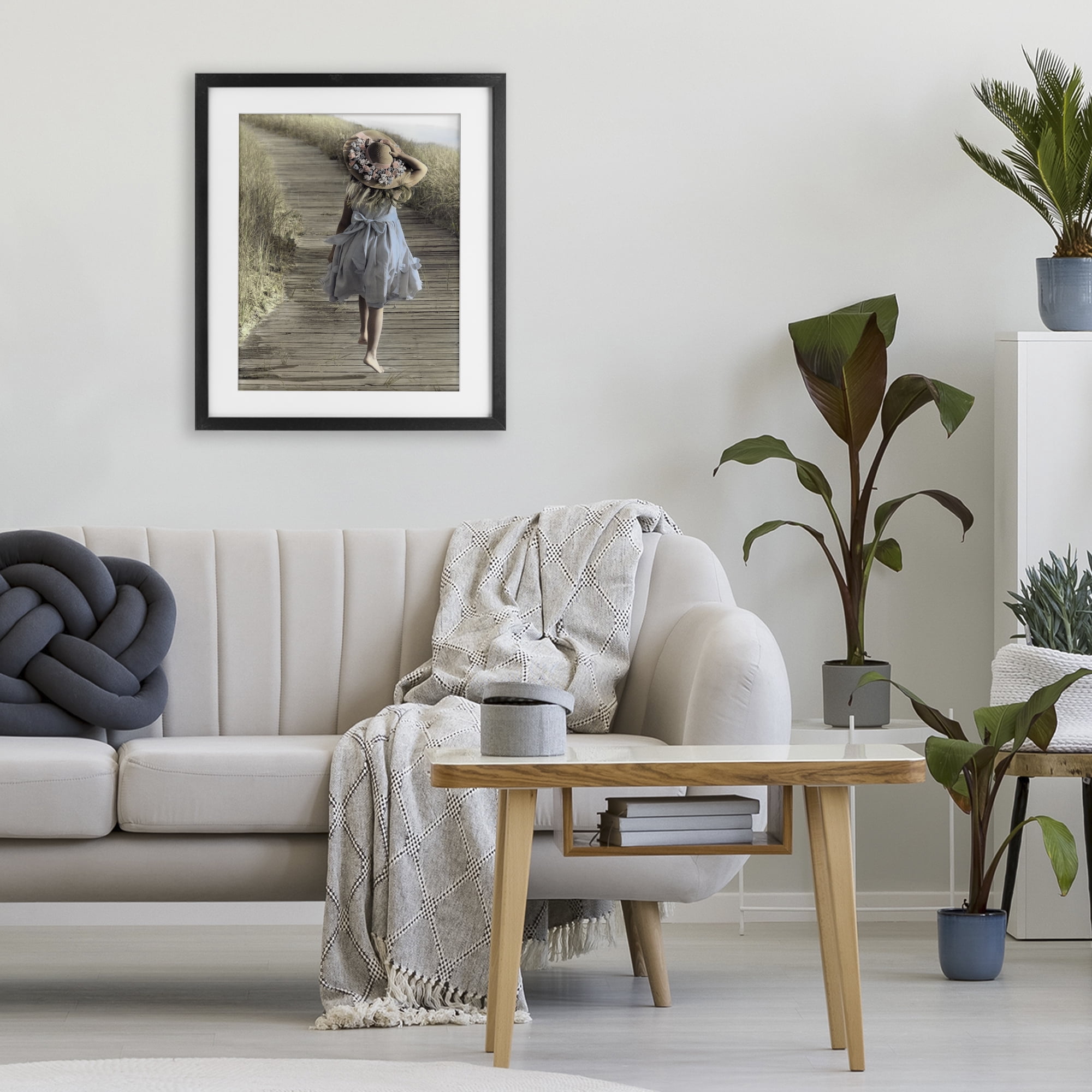Stupell Industries Girl With Sun Hat Walking Black Framed Print Under Glass, design by Kendra Dew