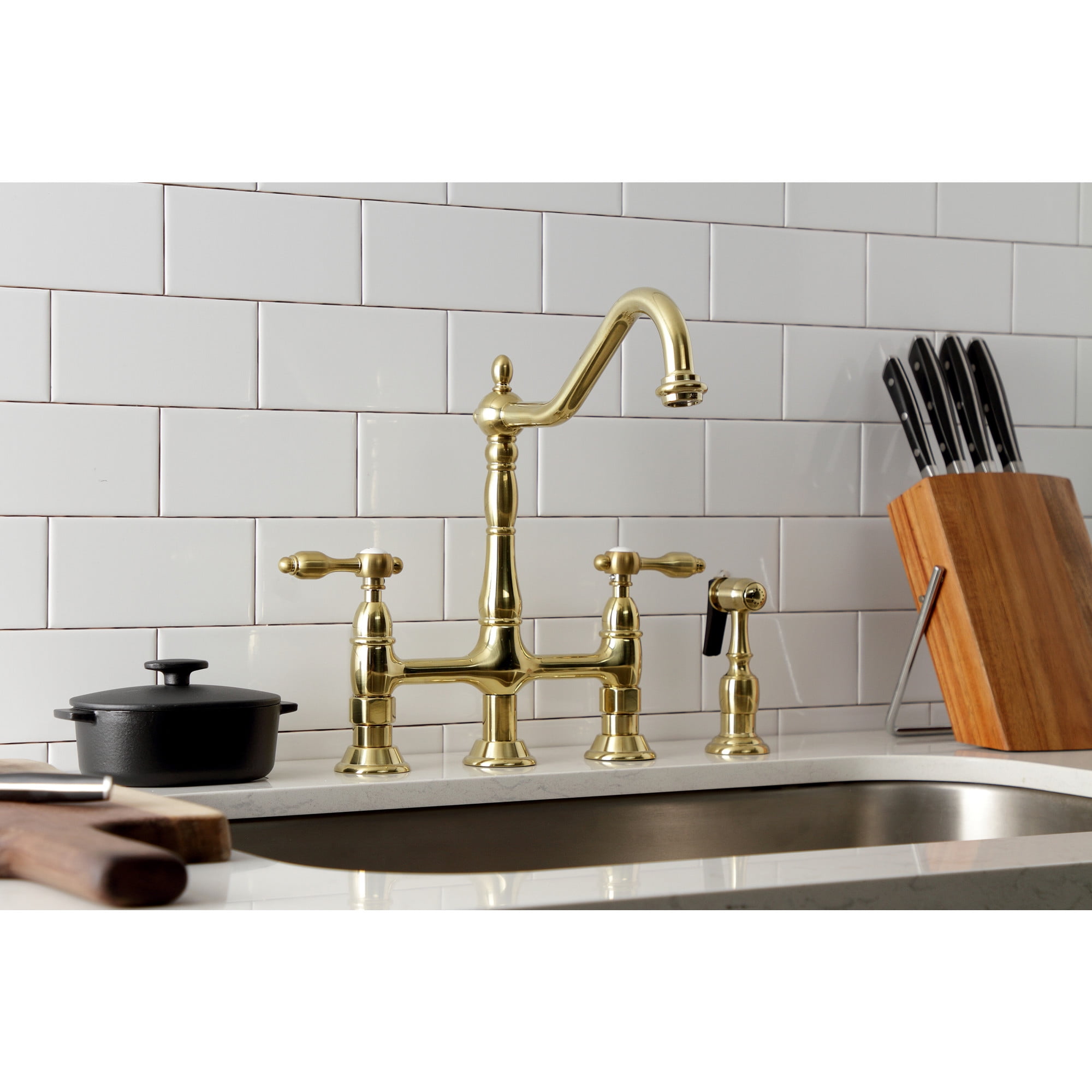 Kingston Brass KS1277TALBS Tudor Two-Handle 4-Hole Deck Mount Bridge Kitchen Faucet with Brass Side Sprayer in Brushed Brass