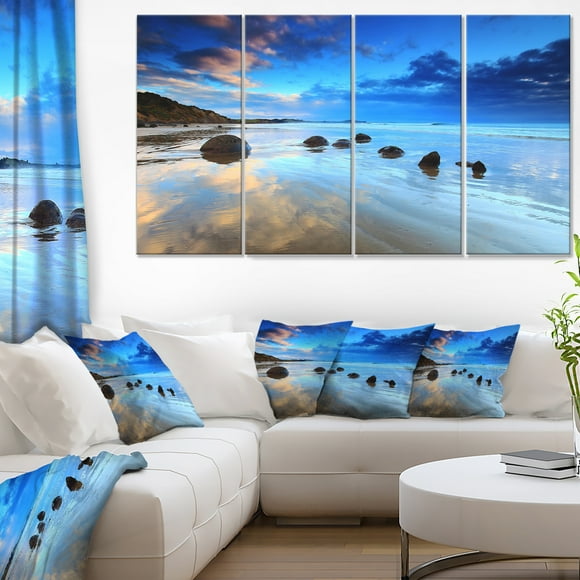 Designart PT9481-271 Moeraki Boulders Under Cloudy Sky, Seashore Photo Canvas Print (4 Piece), 48" x 28"