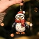 thumbnail image 4 of Llavero navideño de pingüino con sombrero rojo | Colgante acrílico para espejo retrovisor de coche y mochila | Regalo y adorno navideño para niños y adultos, 4 of 5