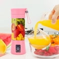 thumbnail image 2 of Extractor de jugo eléctrico portátil con carga USB, taza de plástico verde de 6 hojas, ideal para uso doméstico y viajes., 2 of 7