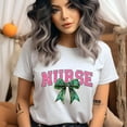 thumbnail image 2 of Nurse Graphic T-Shirt | Pink Lettering with Green Bow Tee for Women, CarolinaBlue, Size XL, 2 of 6