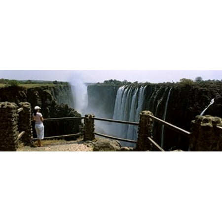 Viewing Images - Woman looking at the Victoria Falls from a viewing point Zambia Canvas Art - Panoramic Images (18 x 7)