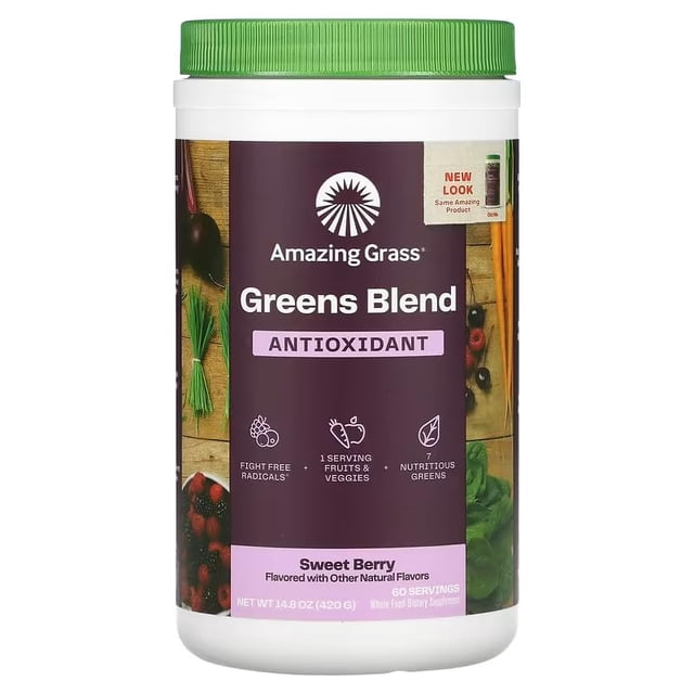 polvo orgánico, increíble superalimento de color verde hierba, antioxidante, 60 porciones frasco blanco con tapa verde; etiqueta frontal morada 'Amazing Grass Greens Blend Antioxidant' con texto 'Sweet Berry', muestra iconos de frutas y verduras y lista visual de ingredientes como pasto de trigo y saúco. A menudo usado como suplemento en batidos y mezclas de proteína.