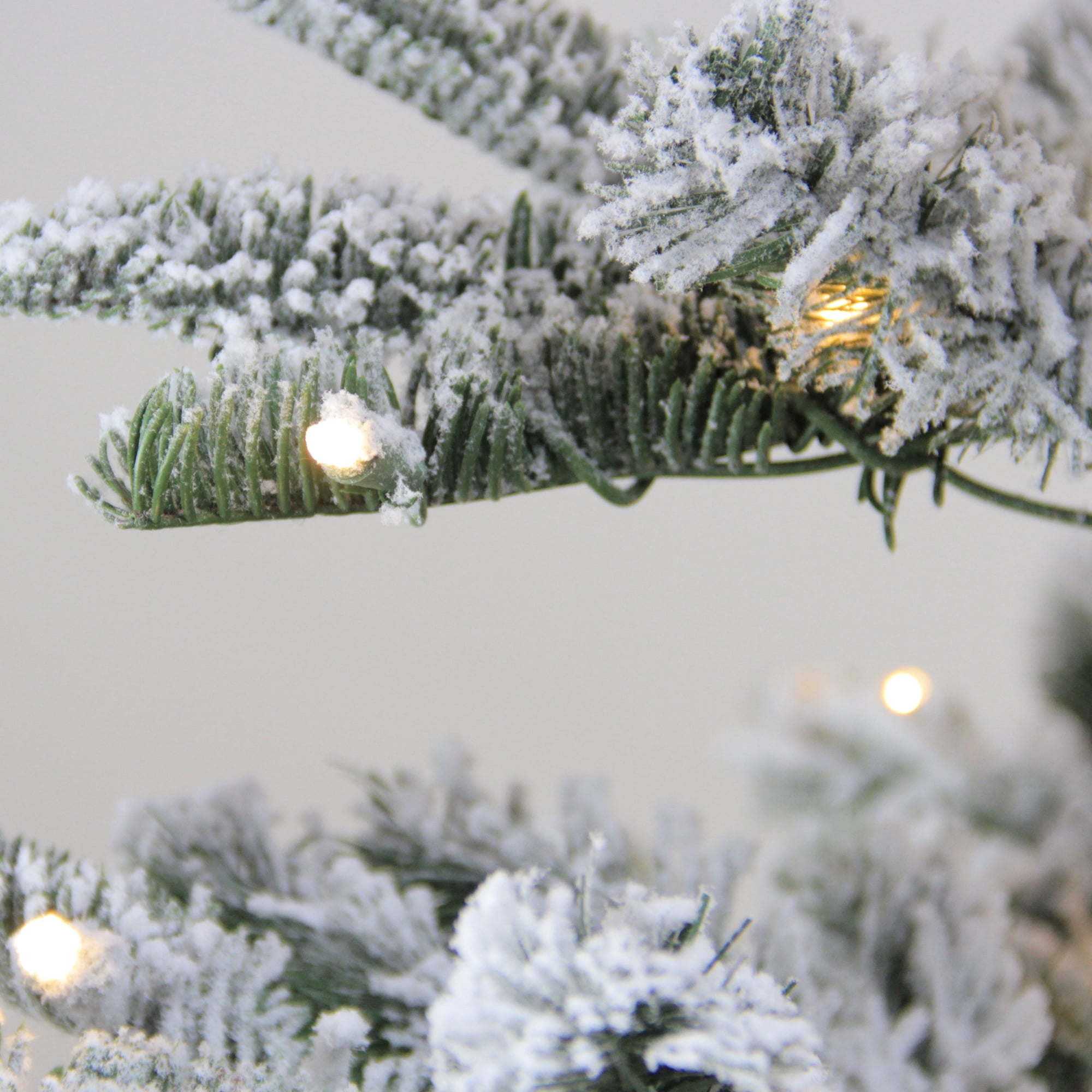 4.5' Pre-Lit Noble Fir Artificial Flocked Christmas Tree - Warm Clear LED Lights