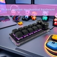 thumbnail image 2 of A Compact And Sturdy Mechanical Keyboard Featuring a 10-Key And 12-Key Layout with 2 Knobs, Designed for Portability And Minimal Desktop Footprint, 2 of 12