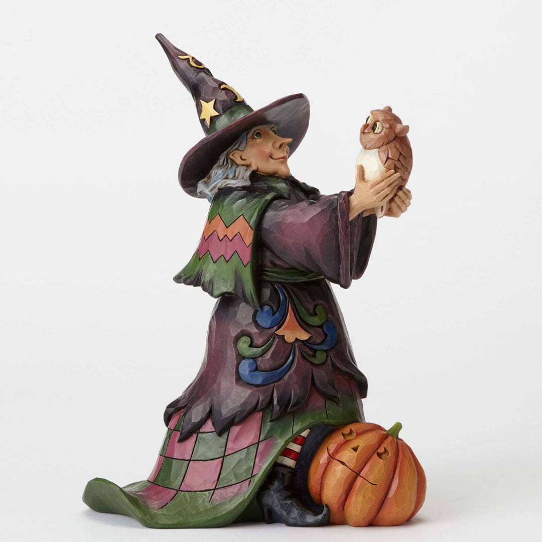 jim shore witch on pumpkin