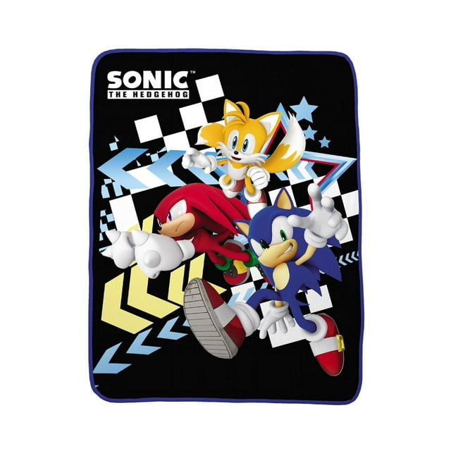 Throw blanket with Sonic the Hedgehog characters Sonic, Tails, and Knuckles in dynamic poses over a checkered flag and arrow design.