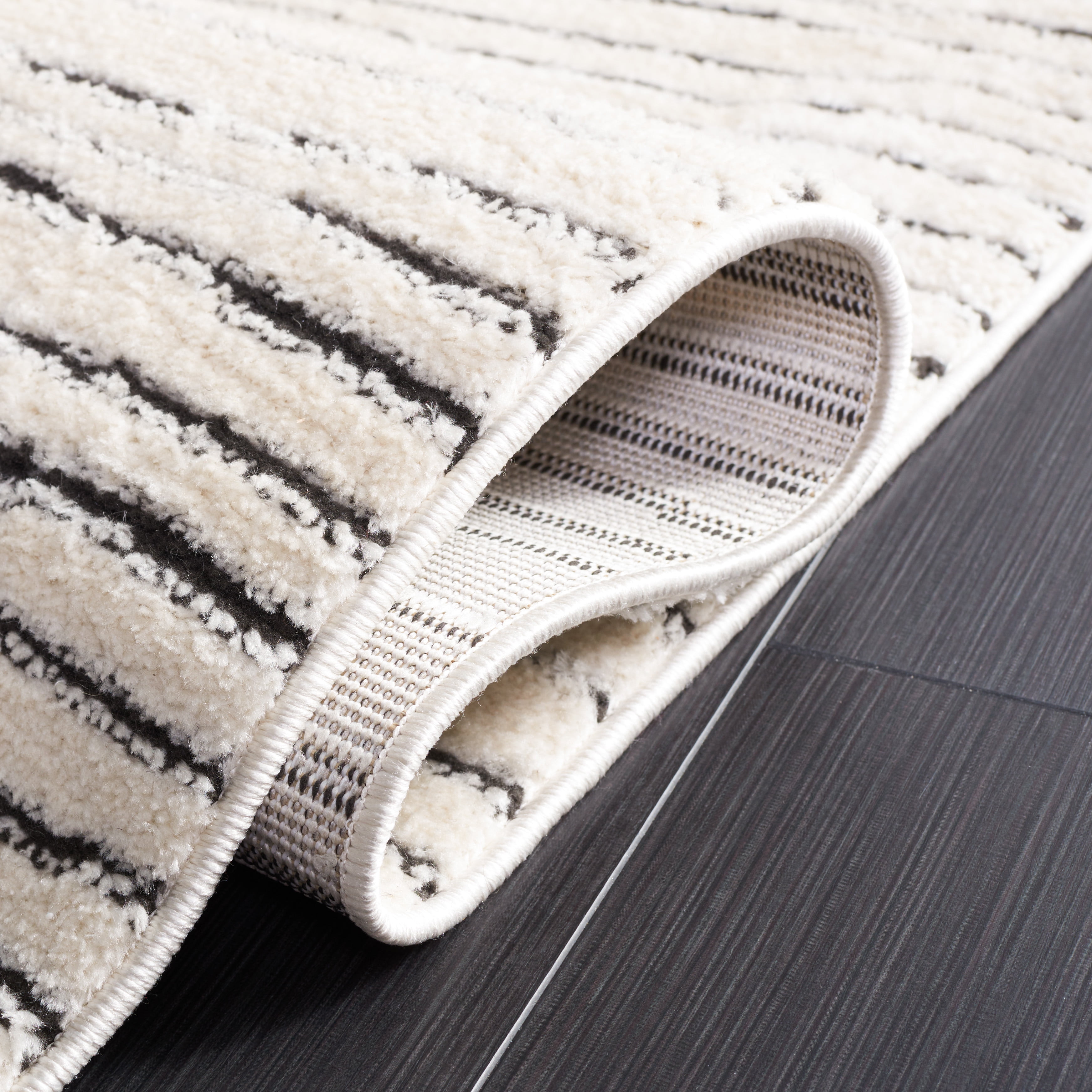 SAFAVIEH Melody Leo Abstract Polyester Runner Rug, Ivory/Black, 2'2" x 12'