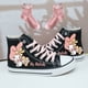thumbnail image 1 of Kuromi Cinnamon Dog Melody primavera y verano lindos zapatos de lona altos combinables para estudiantes femeninas zapatillas informales con grafiti, 1 of 5