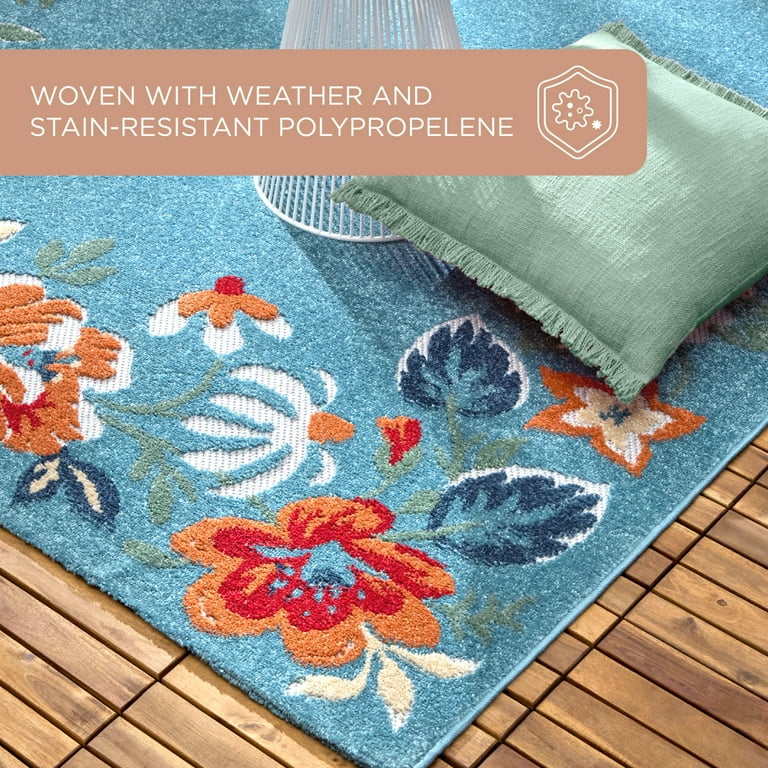 7' X 10' Blue And Ivory Floral Stain Resistant Indoor Outdoor Area Rug 7' X 10' Blue And Ivory Floral Stain Resistant Indoor Outdoor Area Rug