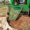 Green, variant on Ataujin Economy Series Stump Bucket Attachment, Universal Skid Steer Quick Tach, Serrated Leading Edge, Tree Scoop Digger