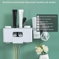 thumbnail image 2 of Soporte para cepillo de dientes, dispensador de pasta de dientes automático montado en la pared, soporte para cepillo de dientes con 2 exprimidores de pasta de dientes y 4 tazas magnéticas con 5 ranur Afortunado Sencillez, 2 of 5
