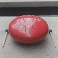 thumbnail image 4 of Tambor de Lengüetas de Acero Inoxidable de 12 Pulgadas con 11 Tonos, Ideal para Meditación y Terapia Musical, Incluye Baquetas y Bolsa de Transporte, Color Rojo., 4 of 6