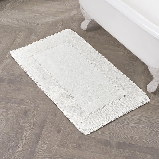 Alfombra de baño Laura Ashley con borde con volantes, color blanco, 70 x 115 cm, 100% algodón