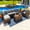 Polyester Light Gray, variant on Tuscany 7-Piece Outdoor Patio Furniture Sectional Sofa Set with Four Modular Sectional Pieces, Armchair, Ottoman, and Coffee Table (Half-Round Brown Wicker, Polyester Light Gray)