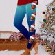 thumbnail image 1 of MKLEKYY Leggings de compresión deportiva para mujer con estampado navideño de fútbol, pantalones de yoga para fitness y entrenamientos., 1 of 4