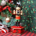 thumbnail image 2 of 12" Animatronic Music Box Nutcracker Figure with Drum – Richly decorated wind up wooden Christmas Decoration - Animated nutcracker decoration plays music and moves. Gold Black Red and Green., 2 of 6