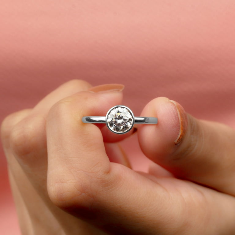 Bezel set moissanite store engagement ring