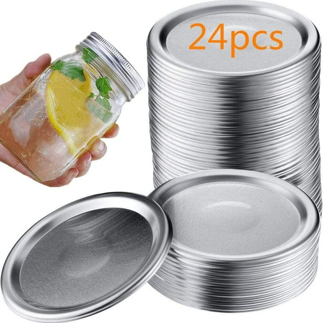 Wide Mouth Canning Lids, 86mm Mason Canning Jar Lids in silver tinplate metal with silicone, shown in a set of 24 pieces. These canning supplies are leak-proof and airtight, ideal for sealing food and maintaining freshness. Fits Ball and Kerr large mouth jars.