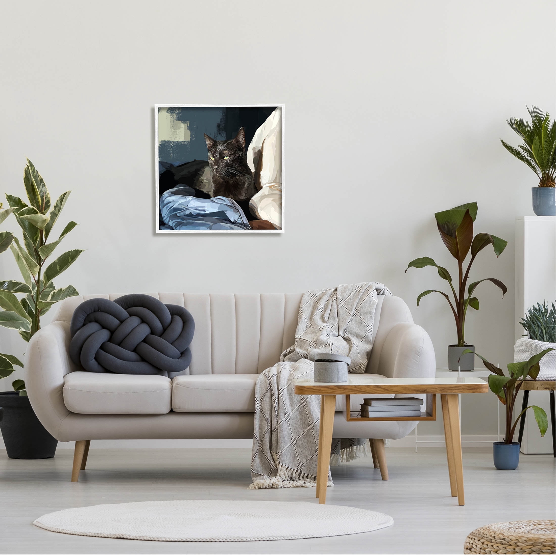 Stupell Industries Black Cat Lounging Comfy Bed Graphic Art White Framed Art Print Wall Art, Design by Emily Kalina