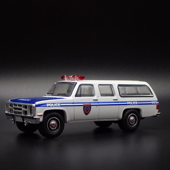 Open Box 1973-1991 GMC SUBURBAN 2500 NYPD POLICE SQUAREBODY 1/64 SCALE DIECAST MODEL CAR