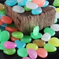 thumbnail image 7 of Travelwant 100Pcs Glow Pebblesm, Glowing Rocks for Outdoor Decor, Garden Lawn Yard, Aquarium, Glow in The Dark Pebbles Stones for Indoor and Outdoor Walkways Garden Driveway Large Bag, 7 of 7
