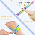 thumbnail image 5 of Pulsera Fidget Toy HUOGUO Push Pop, 12 unidades, para niños y adultos, 5 of 5