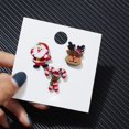 thumbnail image 1 of Juego de 3 broches navideños con diseño de Feliz Navidad, calcetines navideños, alce, insignia esmaltada, broche pequeño, joyería de moda para mujer, regalos para fiestas, 1 of 5