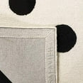 thumbnail image 4 of Safavieh Kids Collection SFK904D Handmade Polka Dot Wool Area Rug, 4' x 6', Ivory / Black, 4 of 4