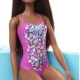thumbnail image 4 of Barbie Doll and Pool Playset with Slide and Accessories, Brunette in Pink Swimsuit, 4 of 6