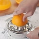 thumbnail image 1 of Exprimidor de limón de acero inoxidable | Extractor de jugo de cítricos con tazón | Prensa manual duradera para naranjas, limones, limas | Diseño fácil de limpiar seguro para alimentos | Herramienta, 1 of 9