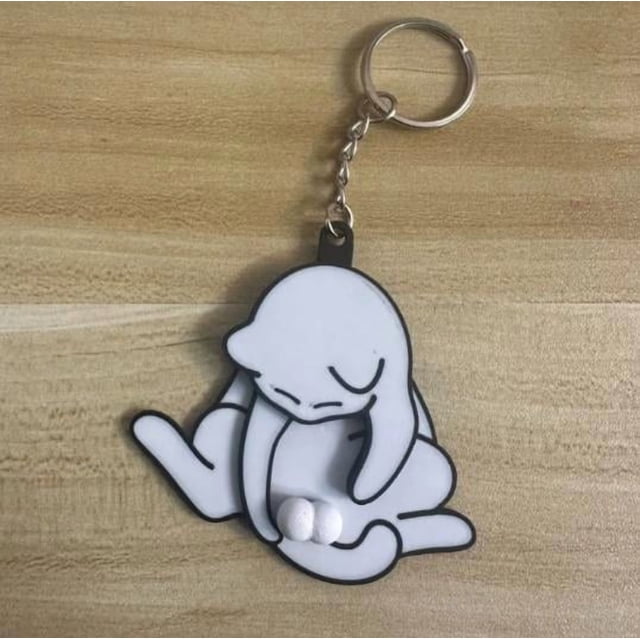 Llavero de gato de dibujos animados: Divertido accesorio giratorio para colgar en mochilas, bolsos y llaves. Llavero decorativo para niñas y mujeres.