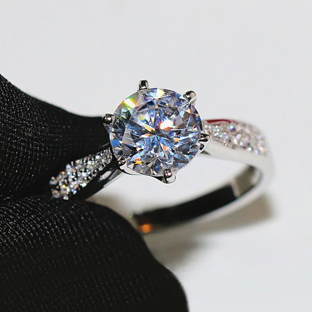 Anillo solitario de cristal de moda para mujer, anillo de compromiso de boda de Zirconia delicada, anillo de matrimonio de promesa de Color plateado para joyería nupcial Tan Jianjun unisex