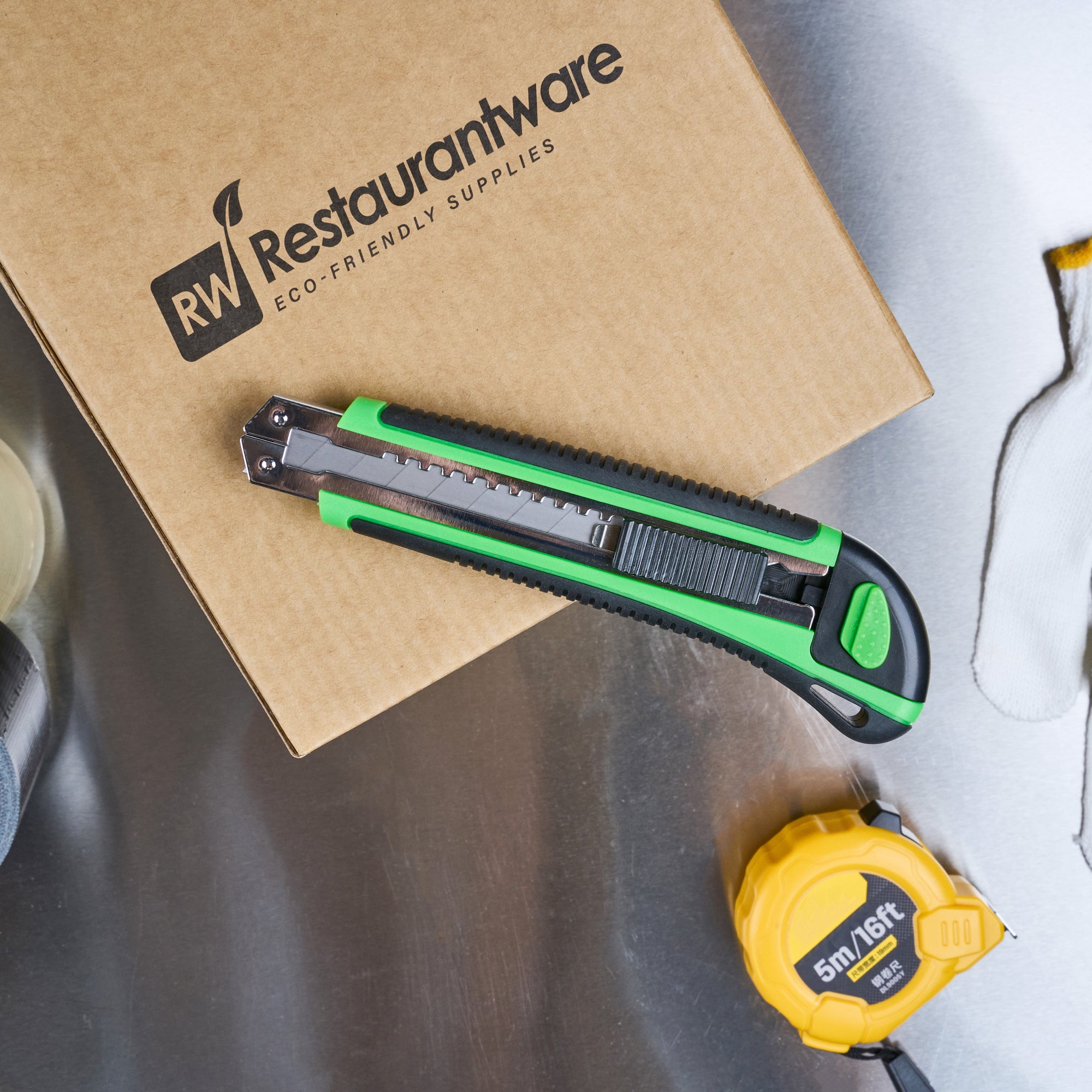 Restaurantware-Handy Tek 6.7 Inch Snap Off Blade Knives, 12 Retractable Box Cutters - Includes 36 Sharp Blades, 18mm Wide, Green Plastic Auto Loading Utility Knives, No-Slip Handle, Built-In Lock