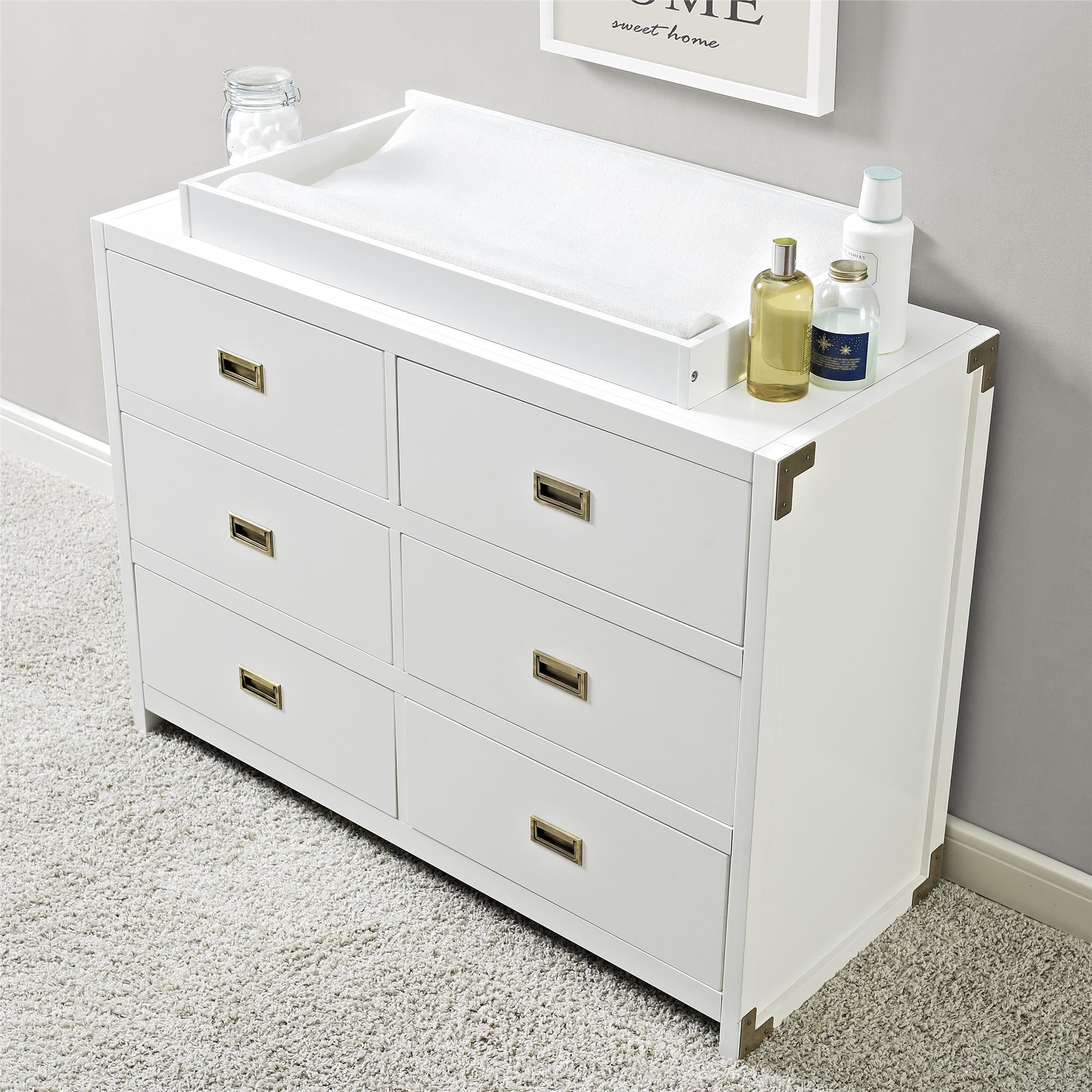 white dresser with changing table topper