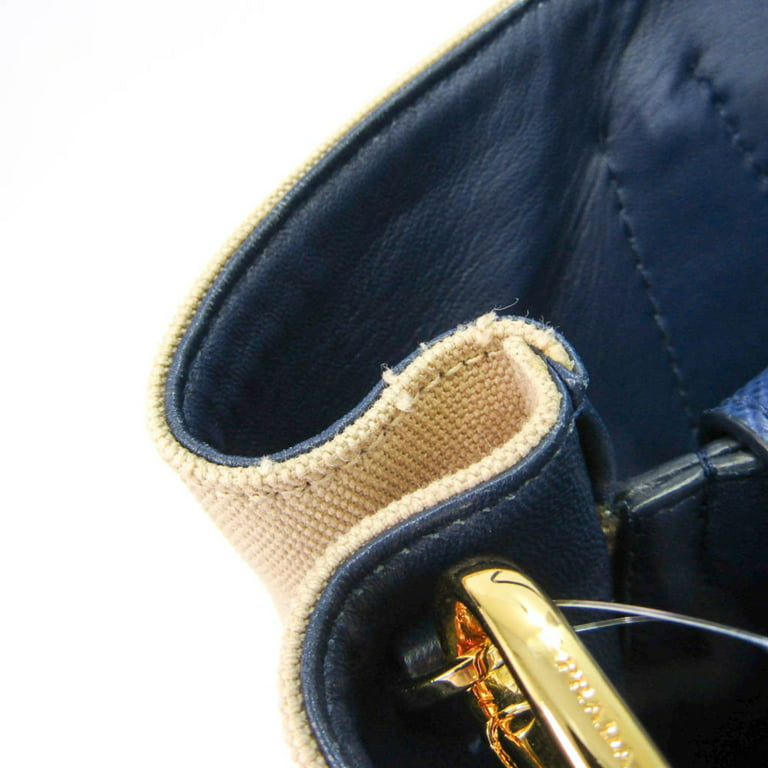 Vintage HERMES Bag in Beige Canvas and Navy Blue Leather at