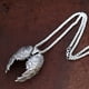 thumbnail image 3 of Colgante de alas de ángel de acero inoxidable, accesorios colgantes de acero de titanio con personalidad de moda europea y americana para hombres y mujeres, 3 of 5