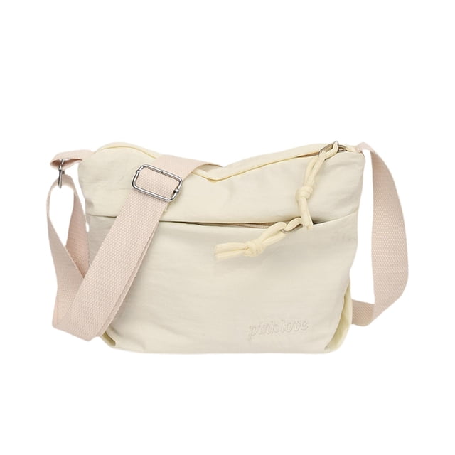Bolso bandolera tipo cartera, elegante y moderno, para viajes y compras. Blanco