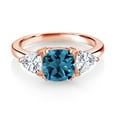 thumbnail image 2 of Gem Stone King 18K Rose Gold Plated Silver London Blue Topaz and White Moissanite 3 Stone Engagement Ring for Women (2.79 Cttw, Gemstone November Birthstone, Available in Size 5, 6, 7, 8, 9), 2 of 3