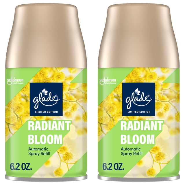 aerosol automático glade radiant bloom 2 recambios para ambientador Radiant Bloom edición limitada, dos recambios de 6.2 oz cada uno para dispensadores automáticos, envase verde con etiqueta azul Glade, ilustración de flores amarillas y tapa dorada; apto para ambientador automático doméstico en habitaciones.