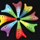 thumbnail image 2 of 12 agujeros mezclados estilo colorido Ocarina forma elegante cerámica Ocarina en Alto C, cielo estrellado-rojo granate Feliz Sencillez, 2 of 5