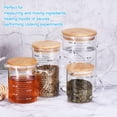 thumbnail image 6 of Uxcell 1000ml Glass Measuring Cup, 3.3 Borosilicate Glass Graduated White Printed Scale with Wood Lid, 6 of 6