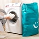 thumbnail image 5 of Bolsa de lavandería con cordón de nailon para el hogar, viajes, ropa sucia, edredones, libros, almacenamiento, cara sonriente azul, 5 of 10