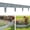 Gray, variant on Set of 20 interlocking stone-textured garden fence panels with edging; features an interlocking, ground-insert design for garden landscaping; highly durable,Black