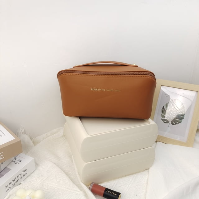 Bolsa de maquillaje popular con alto valor de belleza, bolsa de maquillaje de gran capacidad, almacenamiento de viaje conveniente, bolsa de baño de PU
