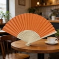 thumbnail image 4 of Yucurem 1 Pack Foldable Handheld Fan, Chinese Folding Fan for Women, Solid Bamboo Paper Fans for Wedding Guests, Dancing, Party Favors (Orange), 4 of 7