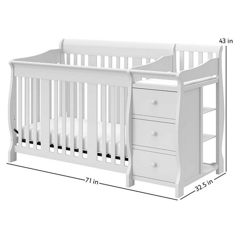 Crib with changing top table and drawers